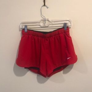 Red Nike shorts with built in compression shorts